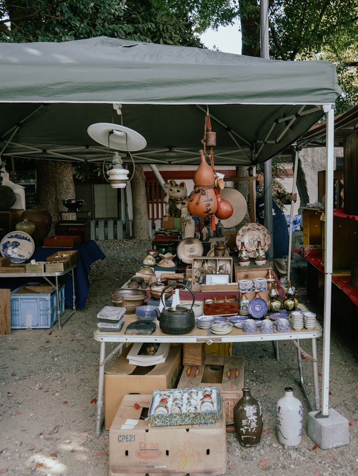 An outdoor market with many items on display